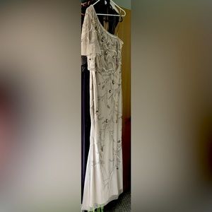 One shoulder formal dress long. Purchased at Macys. Never worn. Original receipt
